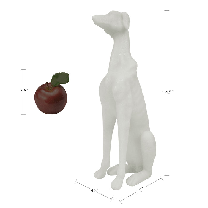 White dog statue with dimensions shown relative to an apple.