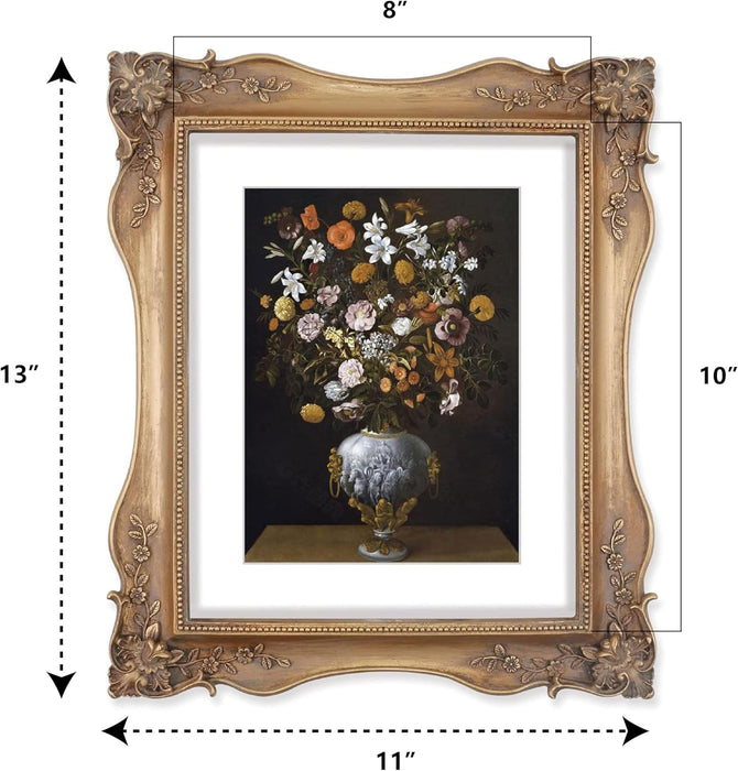 Decorative bronze frame with a painting of flowers and measurements indicated.