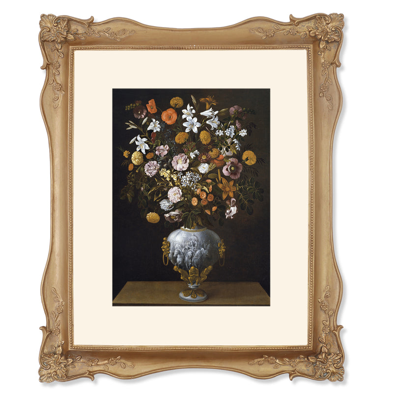 An ornate bronze picture frame with floral carvings around the border, designed for an 11x14 poster.