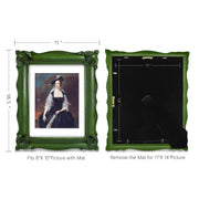 An ornate green picture frame with floral carvings around the border, designed for an 11x14 poster.