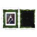 An ornate green picture frame with floral carvings around the border, designed for an 11x14 poster.