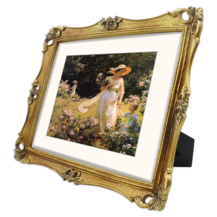 An 11x14-inch picture frame with a mat for an 8x10-inch photo, featuring sculpted edges and decorative accents in a hand-painted antique style finish.