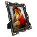 An ornate vintage-inspired picture frame with black edges and gold accents, designed for an 8x10-inch picture, featuring a decorative painting of a woman inside.
