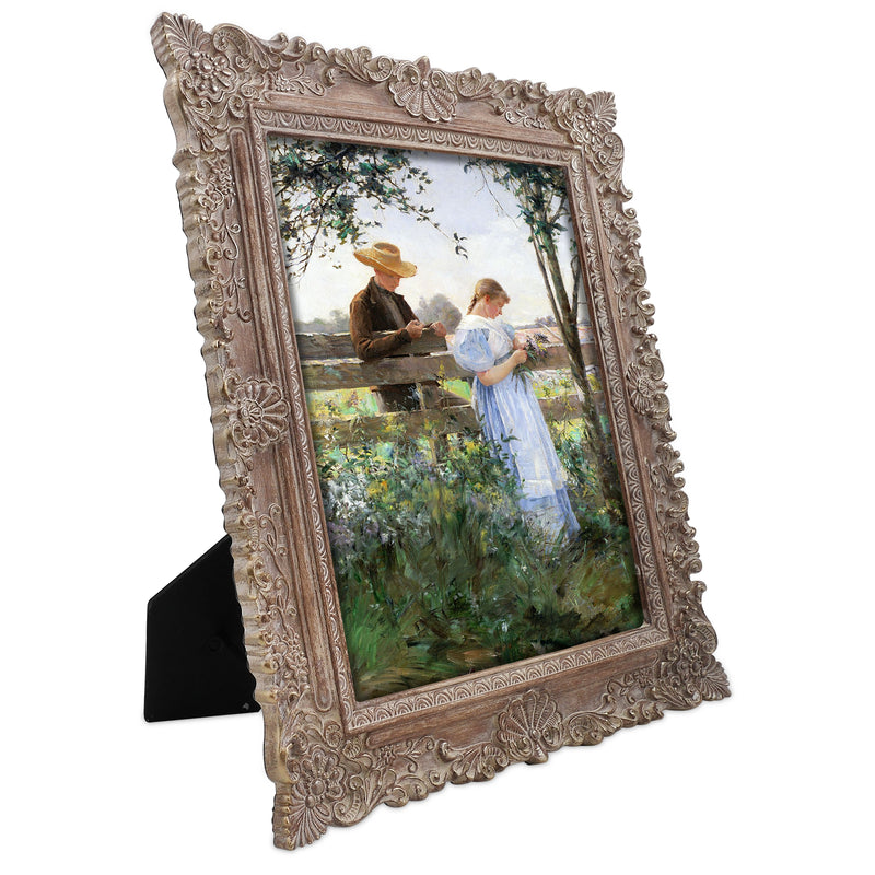 Gold 8x10 vintage picture frame with seashell and floral carved border displayed in home décor setting
