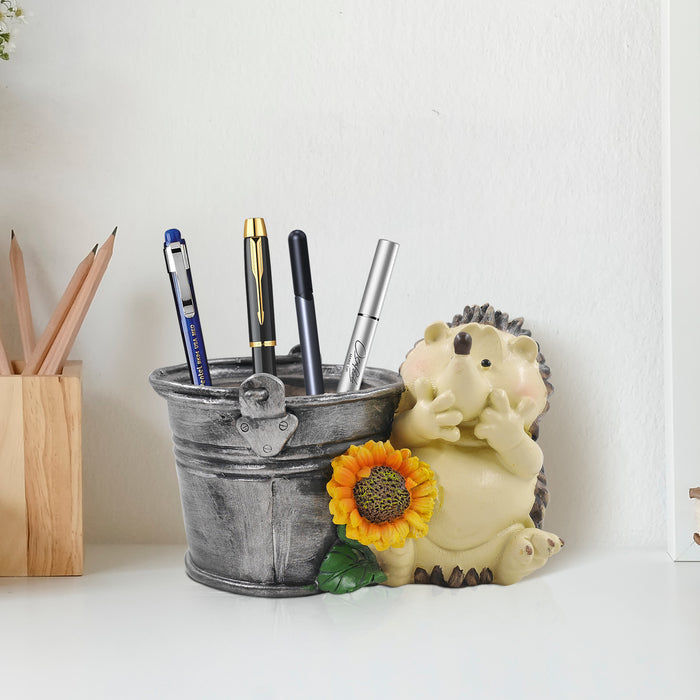 A beige and gray resin hedgehog planter with a sunflower decoration, designed for home garden decor.