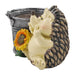 A beige and gray resin hedgehog planter with a sunflower decoration, designed for home garden decor.