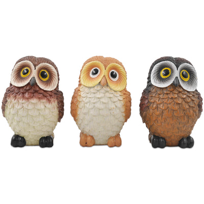 A set of three resin owl figurines, painted in different colors, displayed side by side.