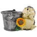 A beige and gray resin hedgehog planter with a sunflower decoration, designed for home garden decor.