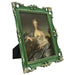 An ornate vintage-inspired picture frame with dark green edges and gold accents, designed for an 8x10-inch picture, featuring a decorative painting of a woman inside.