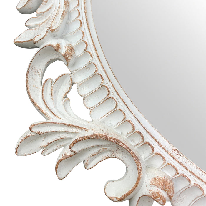 A vintage oval wall mirror with a decorative white frame, designed for mounting on a wall.